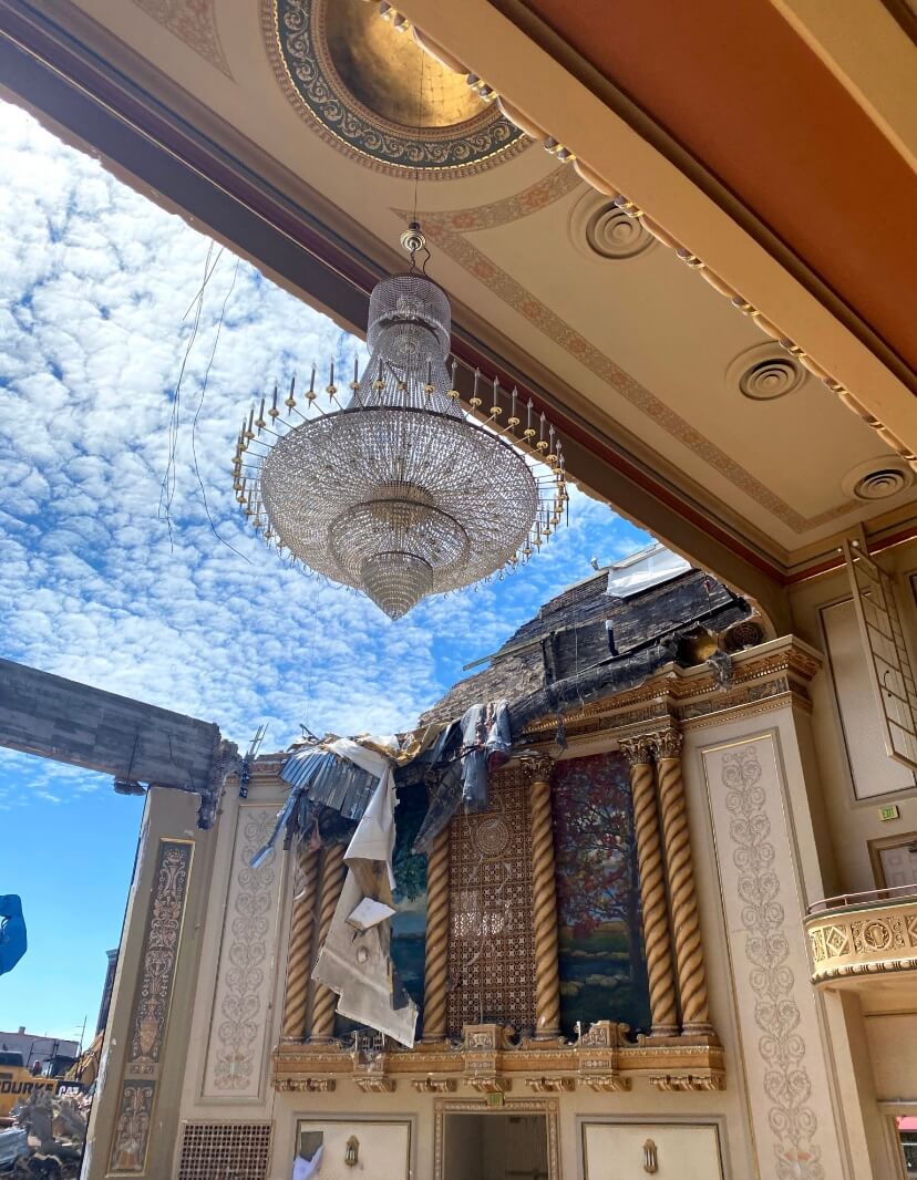 Image showing intact ceiling ornament and open cloudy sky behind it